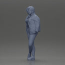 woman standing stylishly hands in pockets striking pose - Only-Games