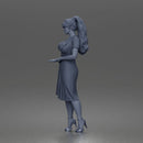 Woman standing In Belted Pinafore Dress Over Blouse With Heeled Sandals