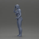 Confused Woman in Bikini Standing with Hand on Forehead - Only-Games