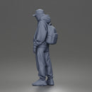 Chill Hooded Cap Walker Posing with Backpack Pants and Sneakers