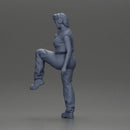 Woman in Headphones Lifting Leg in Stylish Streetwear - Only-Games