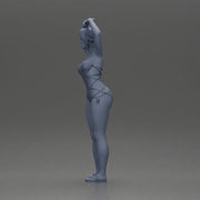 Brunette woman in turquoise swimsuit stretching with elegant ballet pose - Only-Games