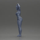 Brunette woman in turquoise swimsuit stretching with elegant ballet pose - Only-Games