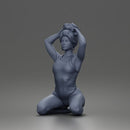 Kneeling Hands On Head Poser in Bodysuit and Hoop Earrings