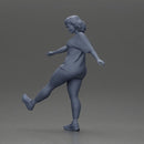 Woman in casual outfit joyfully kicks her leg with energy - Only-Games