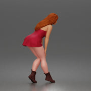 woman bending forward thoughtfully balancing gracefully in mini dress and boots - Only-Games