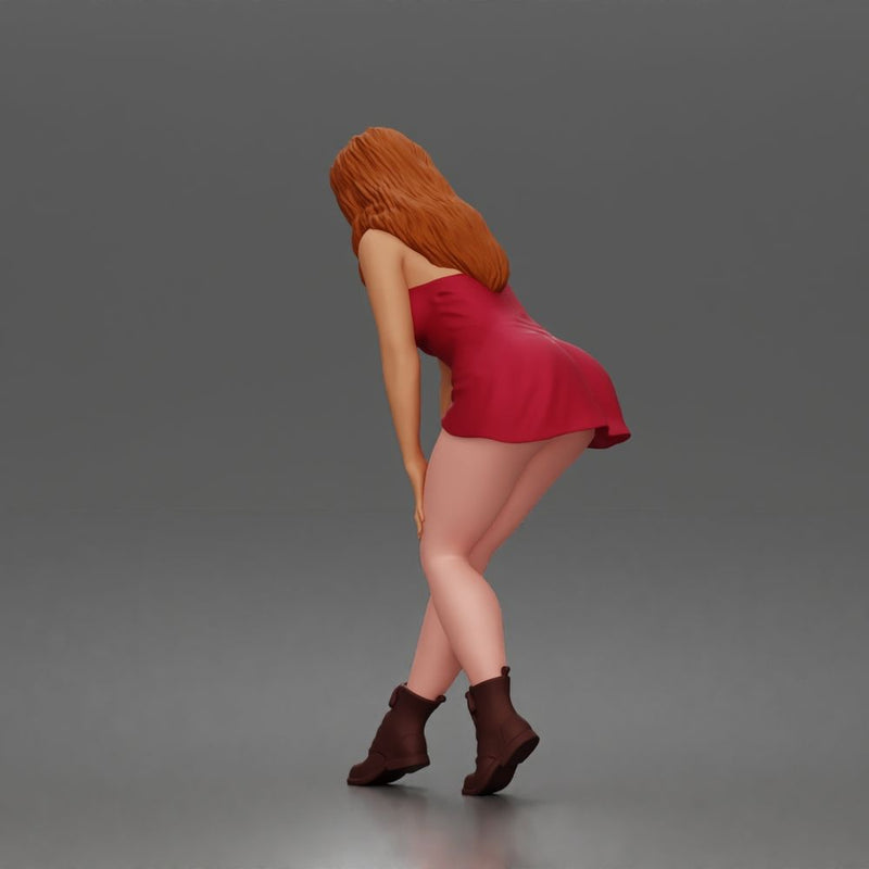 woman bending forward thoughtfully balancing gracefully in mini dress and boots - Only-Games