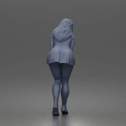 woman bending forward thoughtfully balancing gracefully in mini dress and boots - Only-Games