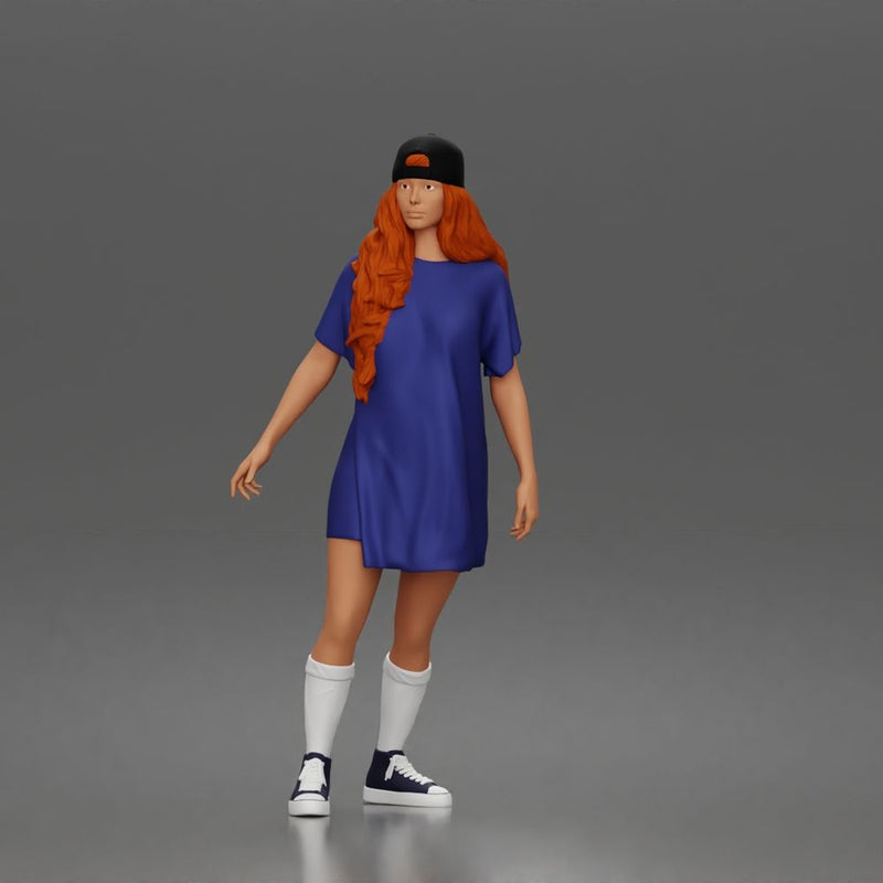 Skateboard girl in long shirt and cap gliding smoothly forward in relaxed street style pose - Only-Games