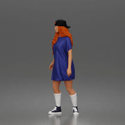 Skateboard girl in long shirt and cap gliding smoothly forward in relaxed street style pose - Only-Games