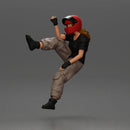 Biker woman in red helmet striking pose on black motorcycle - Only-Games