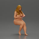 Naked Blonde woman sitting applies hand cream - Only-Games