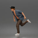 Man Riding Skateboard In Open Short Sleeve Shirt Pants And Sneakers