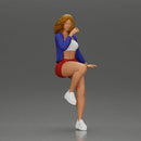 Confident woman sitting gracefully on a sleek modern sportbike - Only-Games