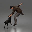 Brave Man Rescuing Dog While Wearing Casual Hoodie and Pants