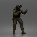Tactical Soldier Aiming Steadily Wearing Combat Gear And Protective Helmet