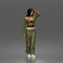 Skater woman holding skateboard wearing crop top baggy pants sneakers