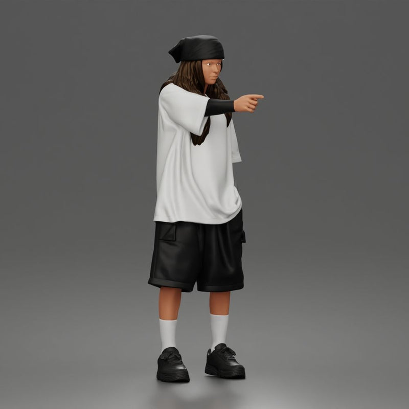 Standing Pointing In Baggy Tee Shorts Long Socks Sneakers Beanie