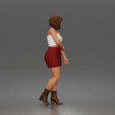 Elegant Woman Standing Gracefully Wearing Strapless Top Skirt And Boots
