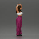 woman striking a heart-shaped pose with joyful energy - Only-Games