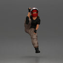 Biker woman in red helmet striking pose on black motorcycle - Only-Games
