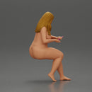 Naked Blonde woman sitting applies hand cream - Only-Games