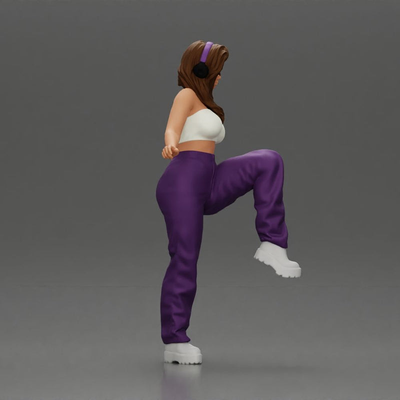 Woman in Headphones Lifting Leg - Only-Games