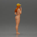 naked girl holding a phone on the beach and wearing a cap - Only-Games