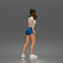 Trendy Woman Standing Confidently in Beanie, Crop Top, and Shorts