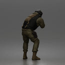 Tactical Soldier Aiming Steadily Wearing Combat Gear And Protective Helmet