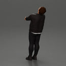 Man in jacket leaning back holding hands enjoying a playful dance moment - Only-Games