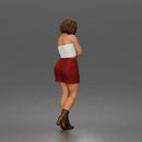 Elegant Woman Standing Gracefully Wearing Strapless Top Skirt And Boots