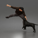 Brave Man Rescuing Dog While Wearing Casual Hoodie and Pants