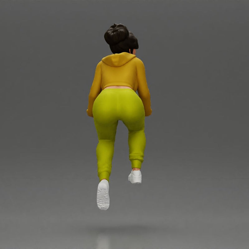 Sporty girl riding a red bike in bright yellow tracksuit - Only-Games