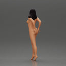 Naked Long black haired woman with one hand on her hip - Only-Games