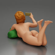 Relaxed Naked Woman Lying on Pillow Taking a Selfie with Phone - Only-Games