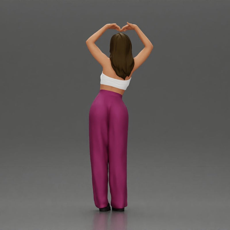 woman striking a heart-shaped pose with joyful energy - Only-Games