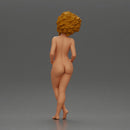 Naked woman posing confidently with voluminous hair - Only-Games