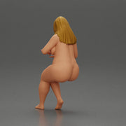 Naked Blonde woman sitting applies hand cream - Only-Games