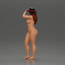 Naked woman striking stylish pose with hat - Only-Games