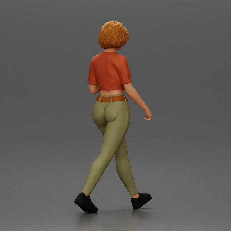 Woman strolls sipping beverage wearing crop top belted pants sneakers - Only-Games