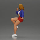 Confident woman sitting gracefully on a sleek modern sportbike - Only-Games