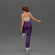 Woman in Headphones Lifting Leg - Only-Games