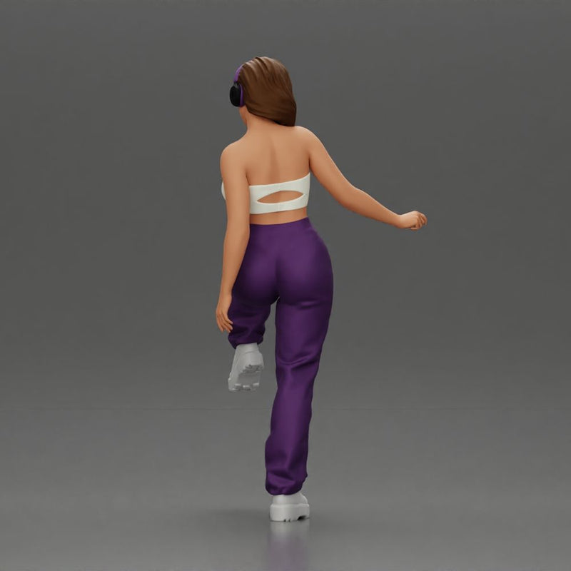 Woman in Headphones Lifting Leg - Only-Games