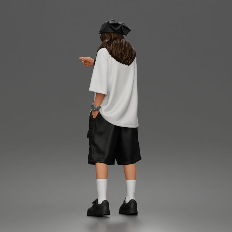 Standing Pointing In Baggy Tee Shorts Long Socks Sneakers Beanie