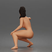 naked woman crouches aiming pistol - Only-Games