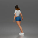 Trendy Woman Standing Confidently in Beanie, Crop Top, and Shorts