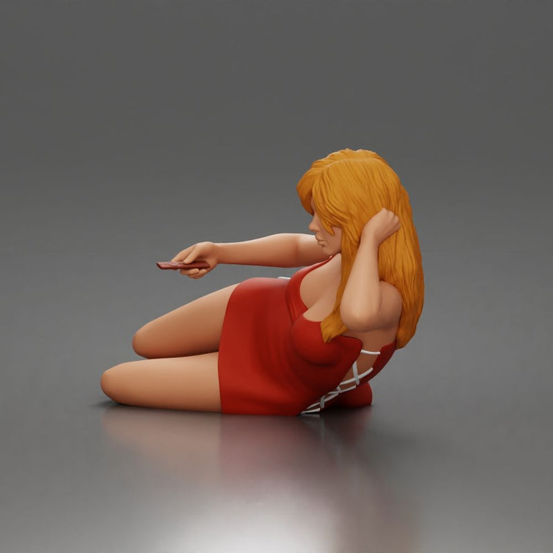 Woman lounges atop pillow watching television holding remote wearing slip dress - Only-Games
