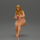 Naked Blonde woman sitting applies hand cream - Only-Games