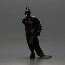 Batman dragging Joker by leg after defeating him in battle - Only-Games